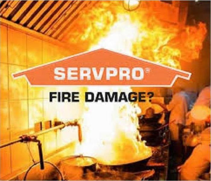 A kitchen fire with the SERVPROlogo over it.