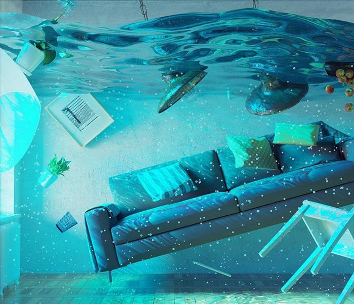 An entire living room filled with water and everything floating. 