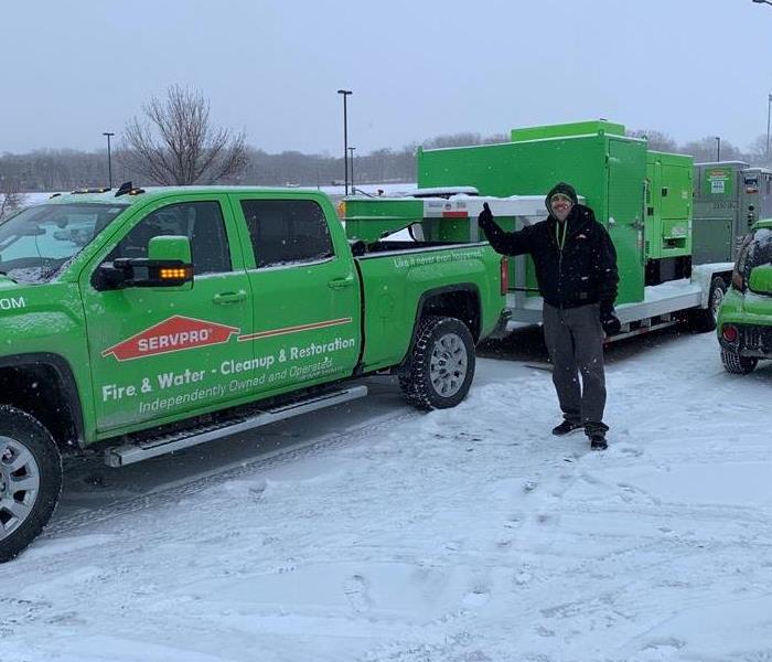 SERVPRO truck with SERVPRO trailer attached